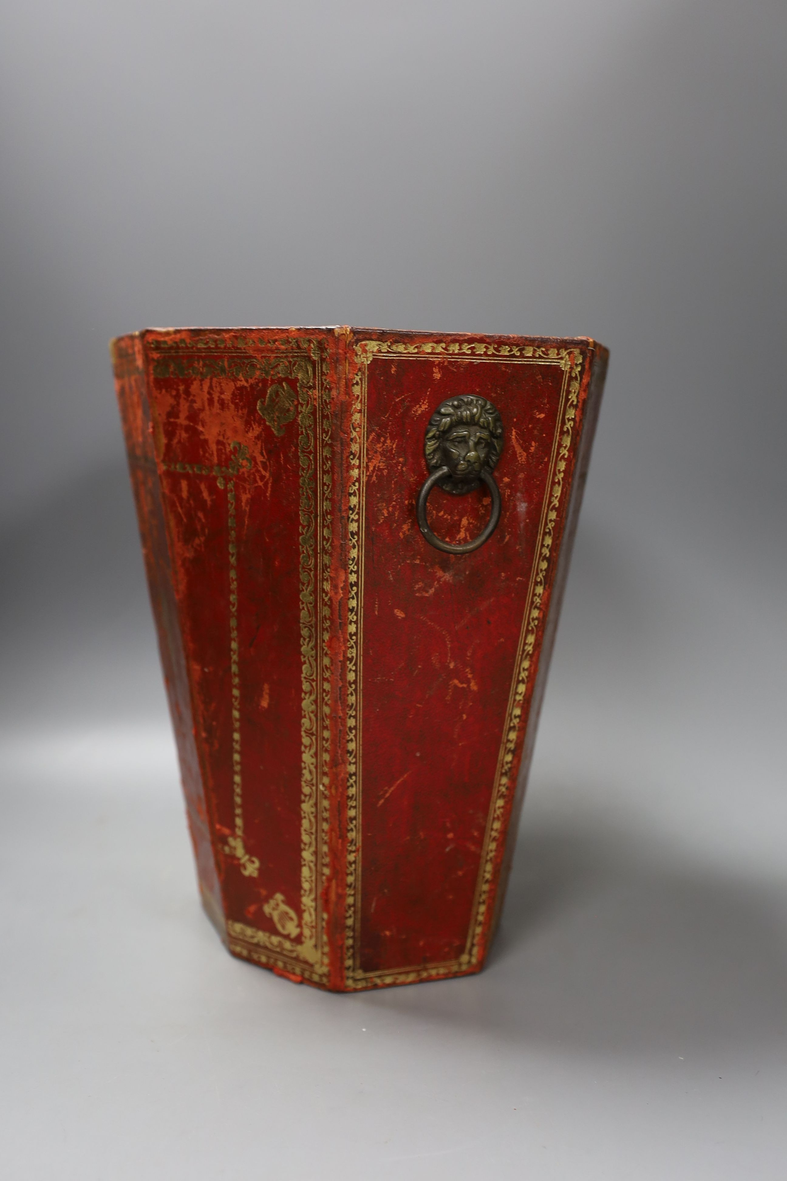 A tooled red leather waste paper basket - 30cm tall